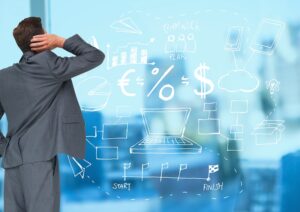 Affärsman som tittar på ekonomin